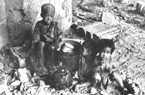 Filipino children homeless amid WWII wreckage